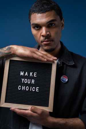 man holding a sign