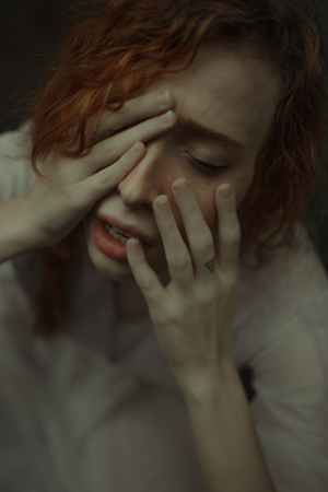 woman face emotion alone